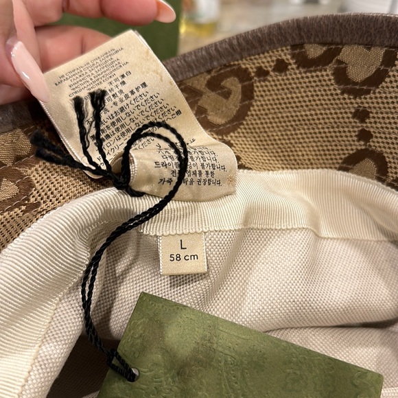 New Gucci hat size large. Has some light makeup stain on inside from trying on - Picture 4 of 7